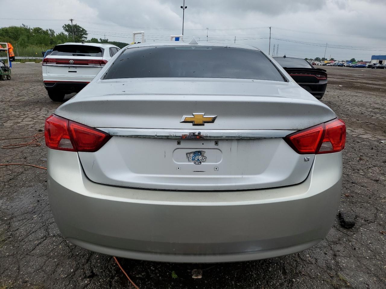 2014 Chevrolet Impala Lt VIN: 2G1125S3XE9122521 Lot: 64869834