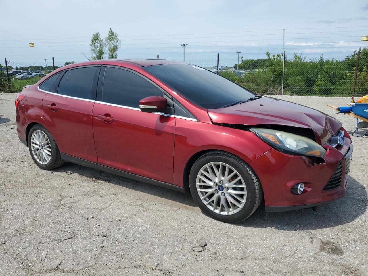 2014 Ford Focus Titanium VIN: 1FADP3J2XEL206307 Lot: 62983234