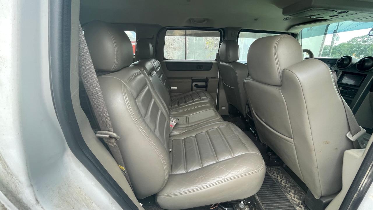 2003 Hummer H2 VIN: 5GRGN23U73H107285 Lot: 65498694