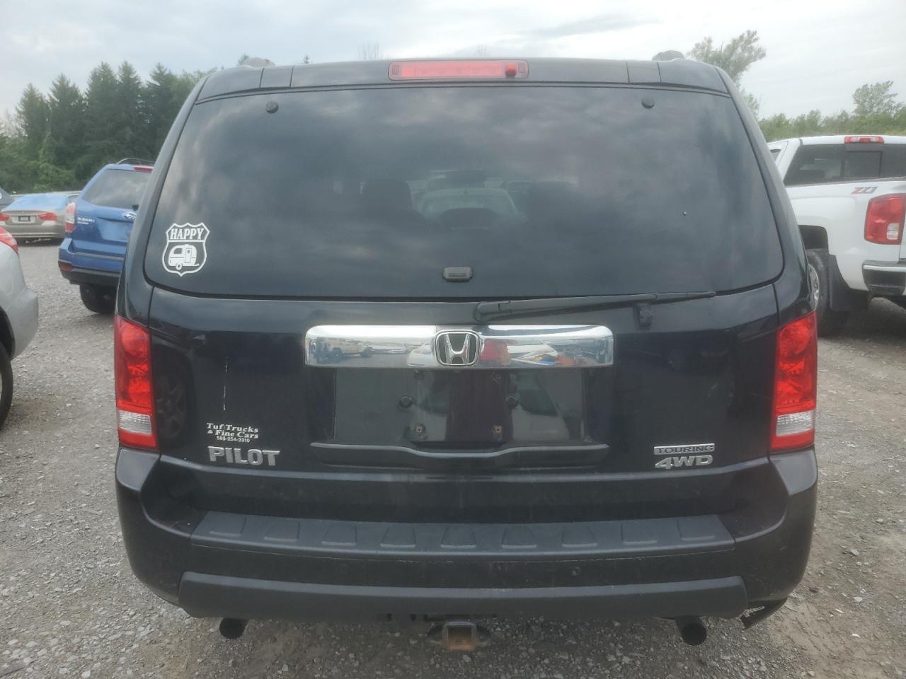 2010 Honda Pilot Touring VIN: 5FNYF4H94AB020590 Lot: 63476674