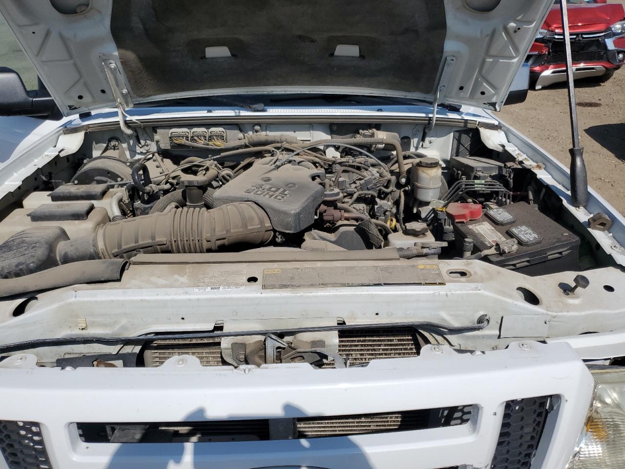 2011 Ford Ranger Super Cab VIN: 1FTLR4FEXBPA40562 Lot: 63122594