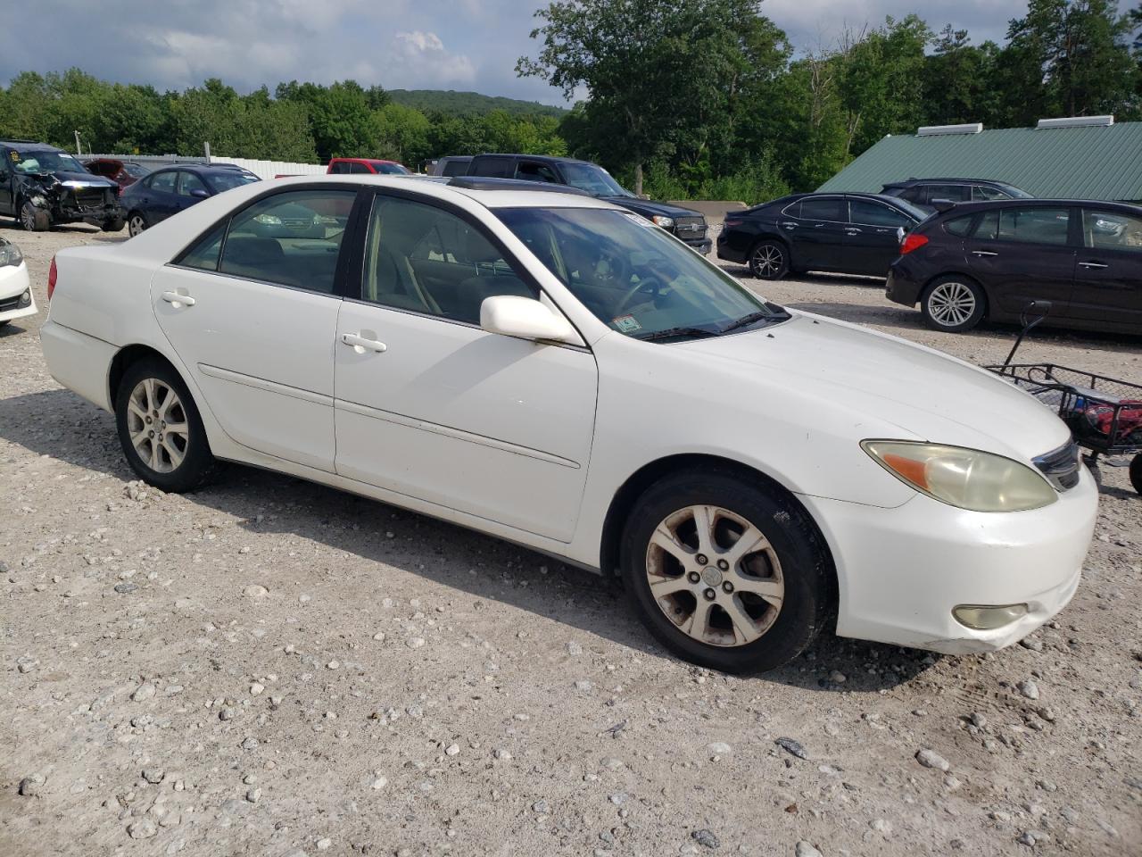 2004 Toyota Camry Le VIN: JTDBE32K240271870 Lot: 65217904