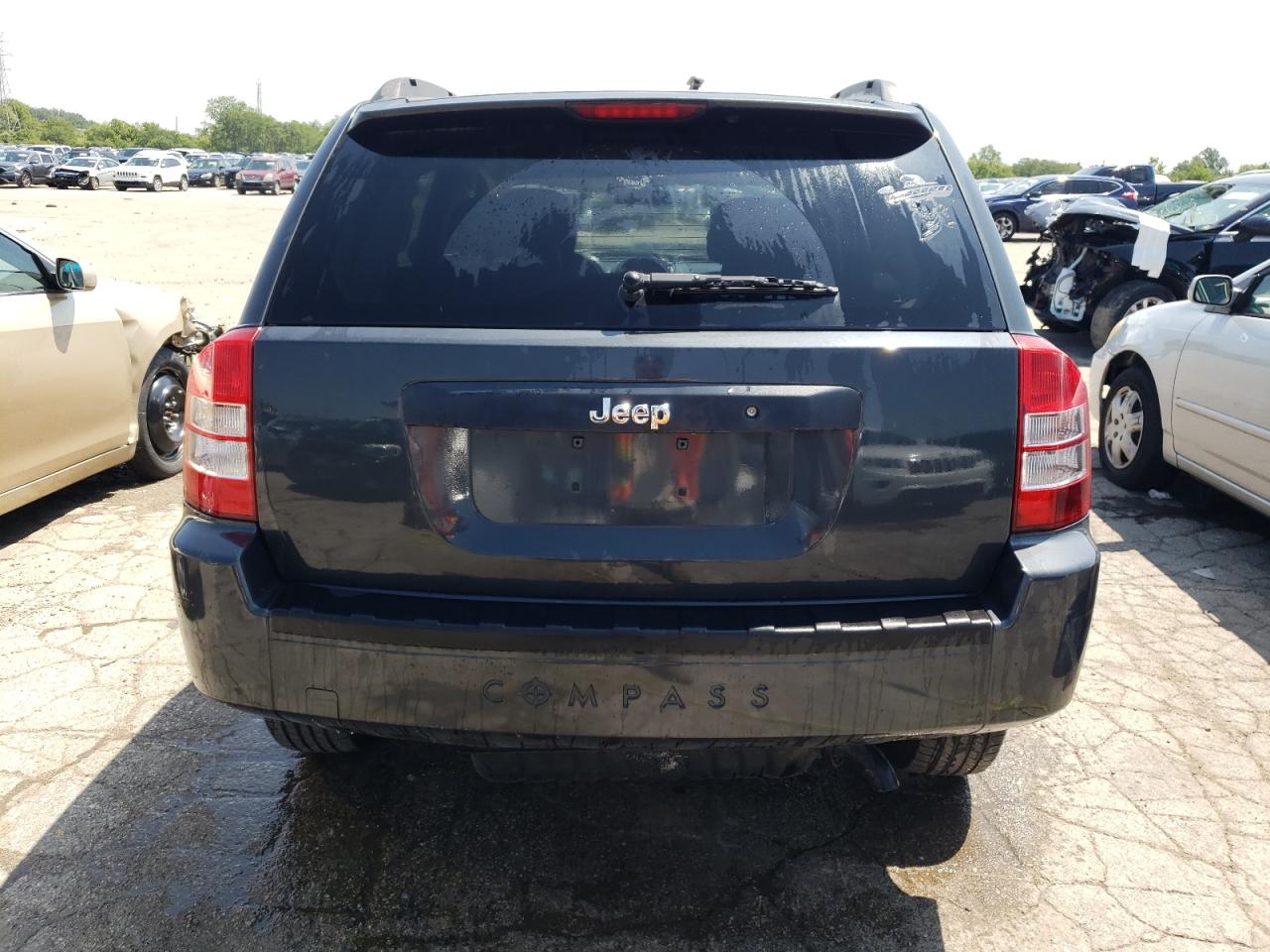 2010 Jeep Compass Sport VIN: 1J4NT1FB9AD647156 Lot: 63267484