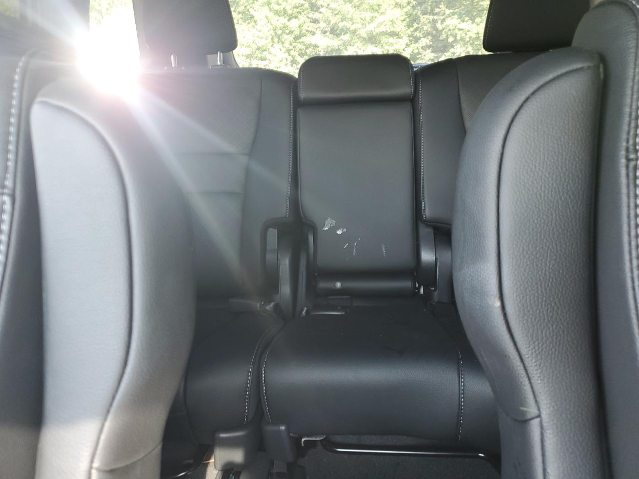 2023 Honda Passport Elite VIN: 5FNYF8H05PB021569 Lot: 63390614