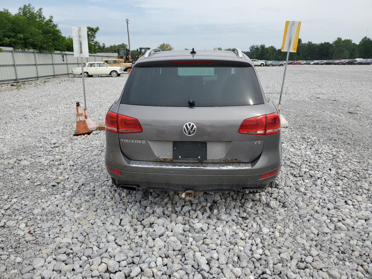 2011 Volkswagen Touareg V6 VIN: WVGFF9BPXBD004510 Lot: 64106064