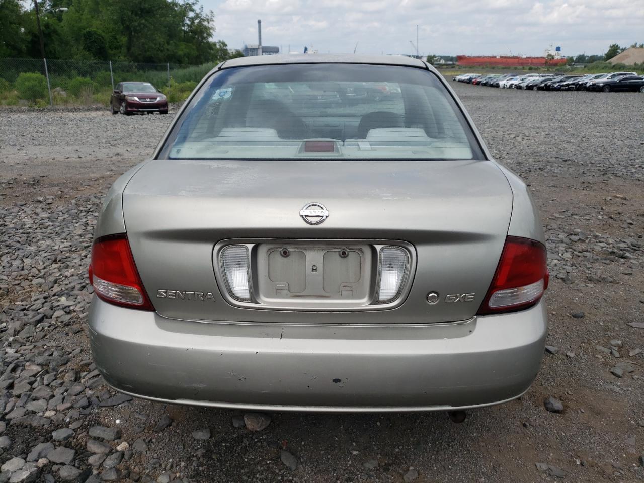 2003 Nissan Sentra Xe VIN: 3N1CB51D93L812106 Lot: 65360044