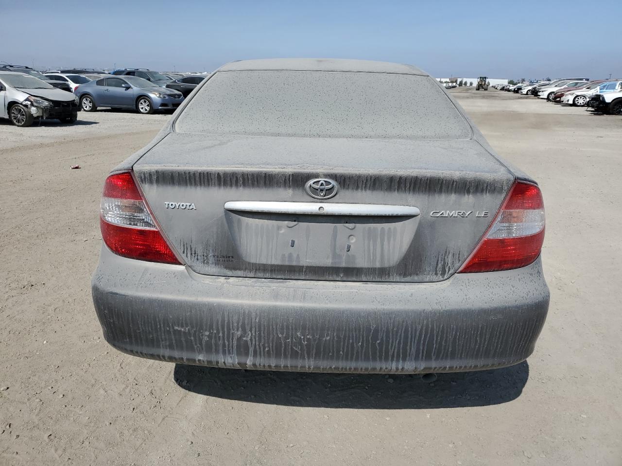 2003 Toyota Camry Le VIN: 4T1BE32K33U779106 Lot: 63313104