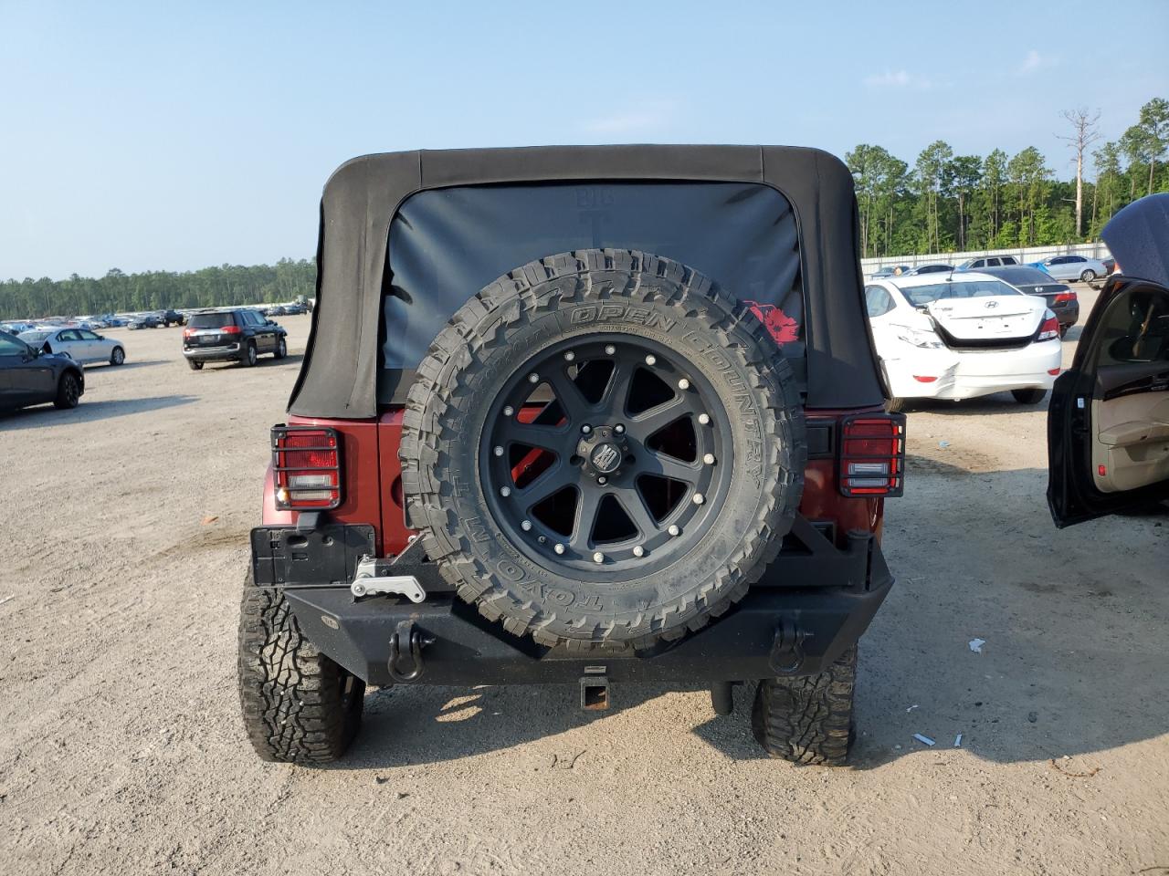 2009 Jeep Wrangler Unlimited Sahara VIN: 1J4GA59119L781850 Lot: 63063004