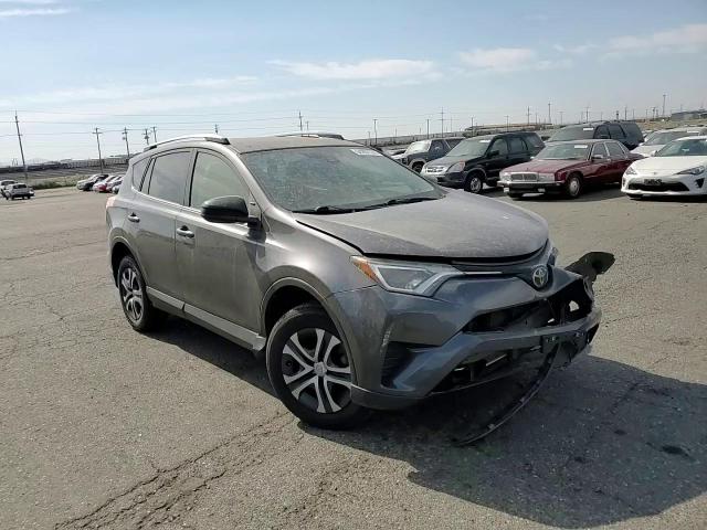2018 Toyota Rav4 Le VIN: JTMBFREVXJJ205532 Lot: 64207174