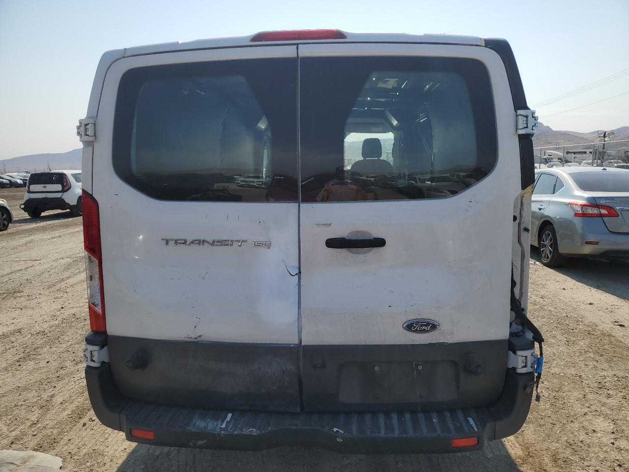 2016 Ford Transit T-150 VIN: 1FTYE2YM7GKB31335 Lot: 67001484