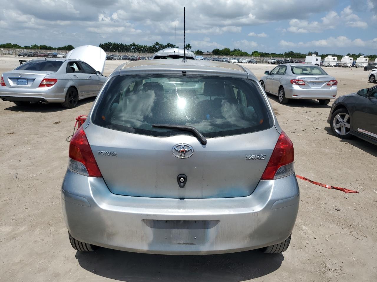 2011 Toyota Yaris VIN: JTDKT4K35B5338403 Lot: 62042434