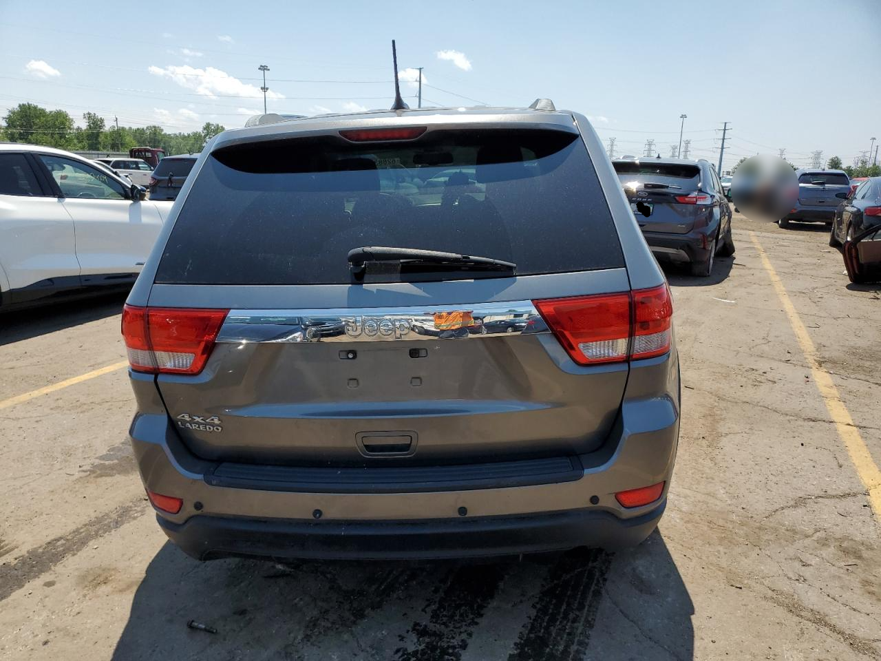 1C4RJFAG2CC219693 2012 Jeep Grand Cherokee Laredo