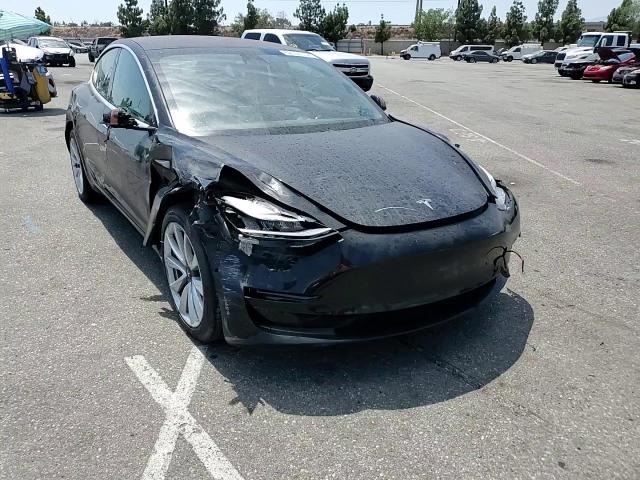 2018 Tesla Model 3 VIN: 5YJ3E1EA5JF154566 Lot: 62594734