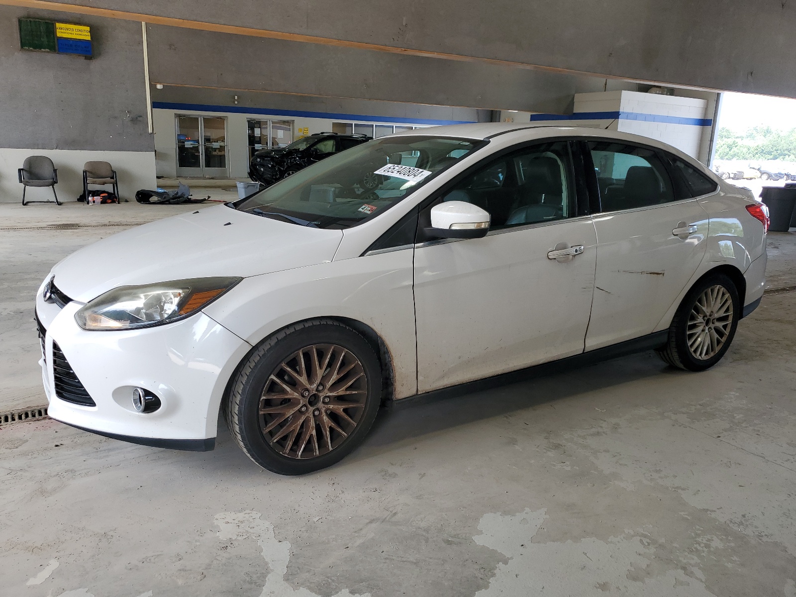 2014 Ford Focus Titanium vin: 1FADP3J25EL222043