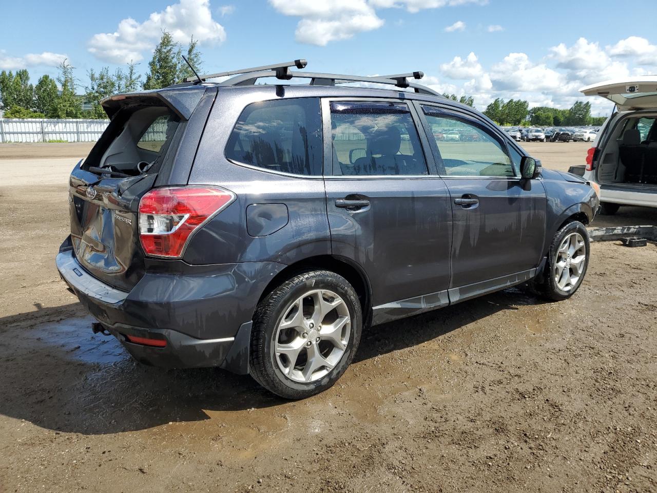 2015 Subaru Forester 2.5I Touring VIN: JF2SJCWC7FH555838 Lot: 64702634