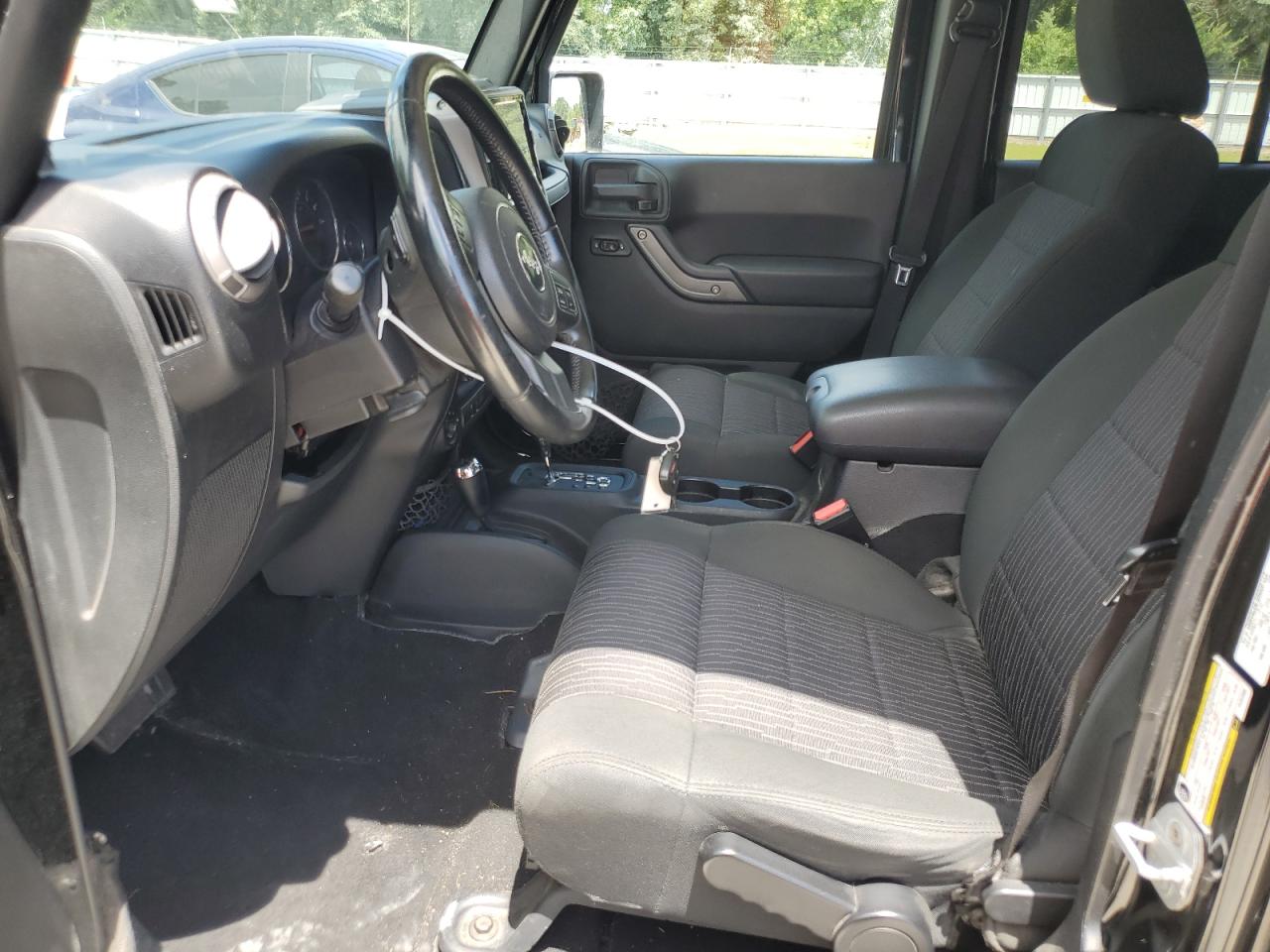 2012 Jeep Wrangler Unlimited Sport VIN: 1C4BJWDG3CL201099 Lot: 63874254