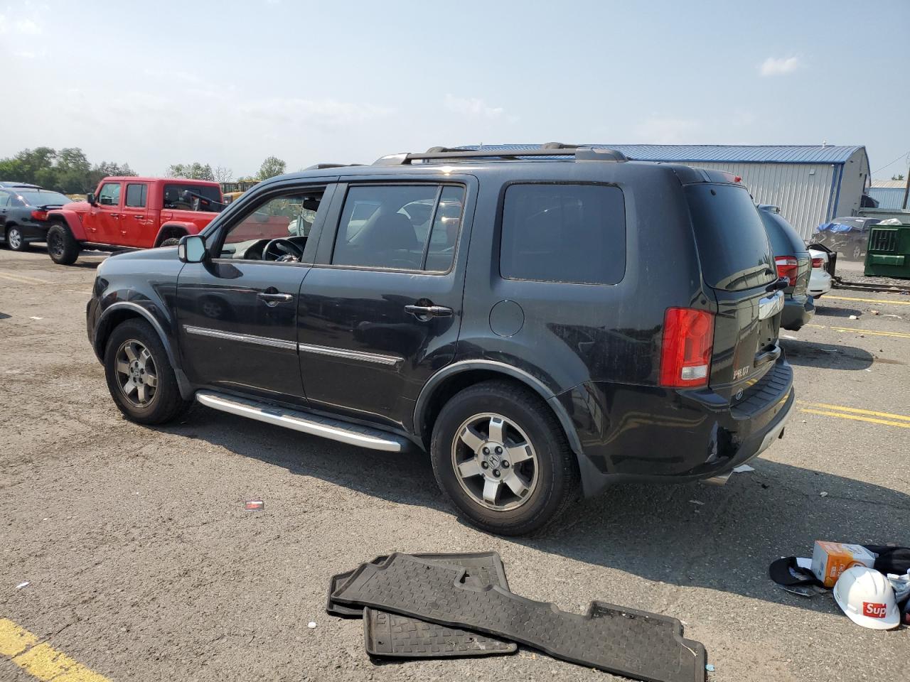 2011 Honda Pilot Touring VIN: 5FNYF4H98BB056915 Lot: 63403934