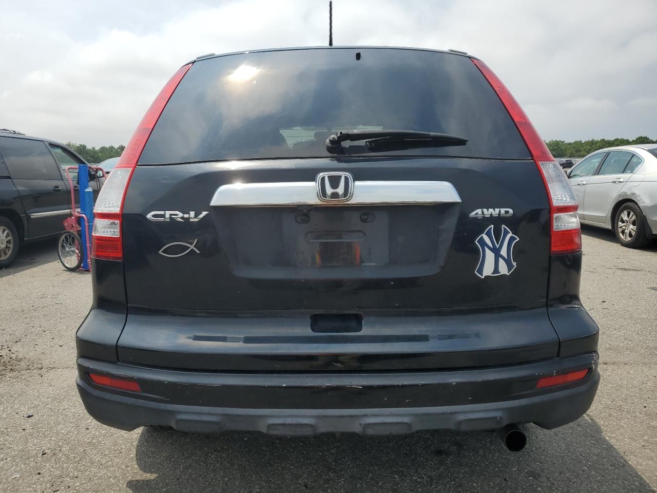2010 Honda Cr-V Exl VIN: JHLRE4H70AC007809 Lot: 62353724