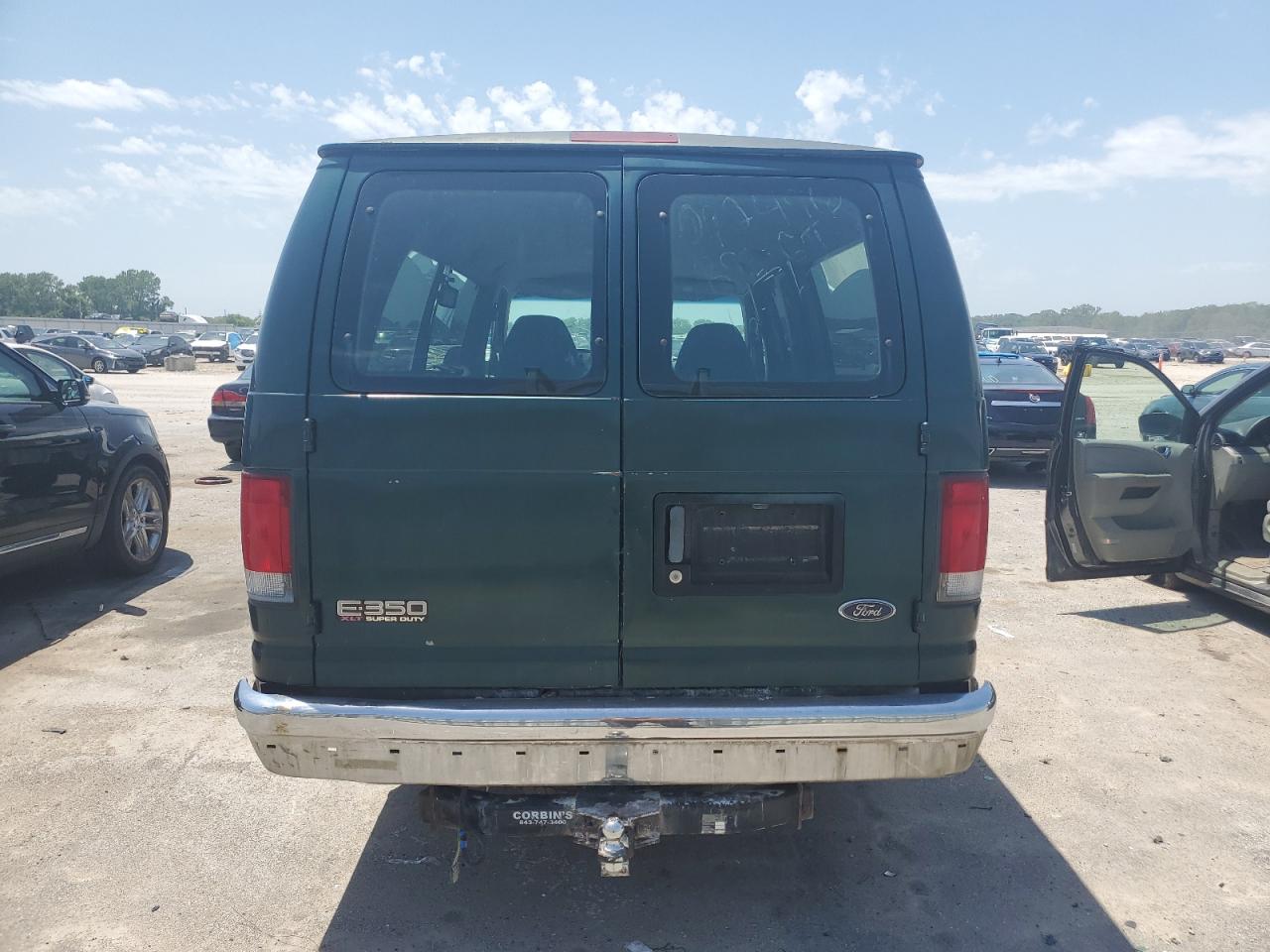 1999 Ford Econoline E350 Super Duty Wagon VIN: 1FBSS31LXXHB59153 Lot: 61094374