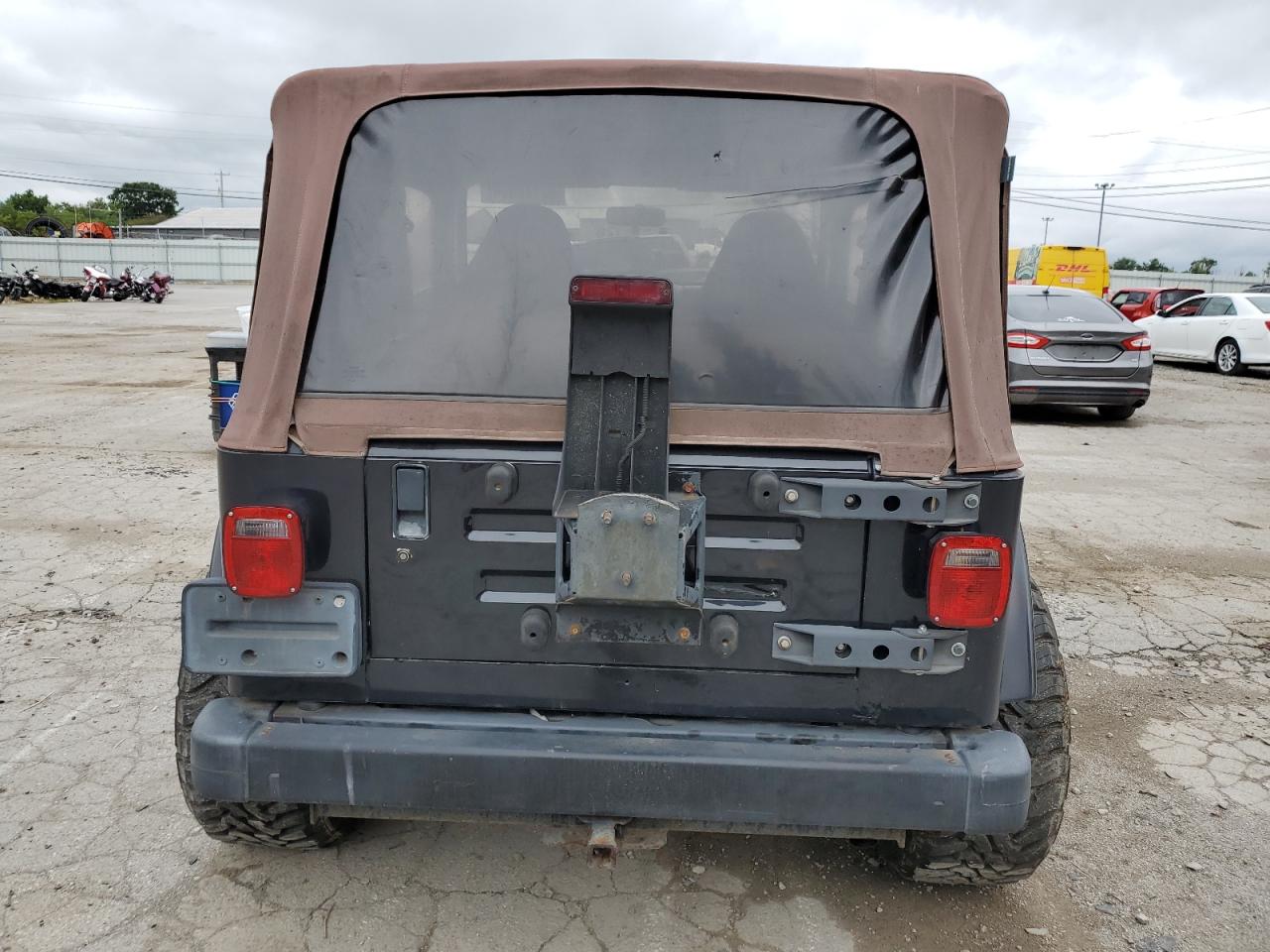 1999 Jeep Wrangler / Tj Sahara VIN: 1J4FY49SXXP404594 Lot: 65126534