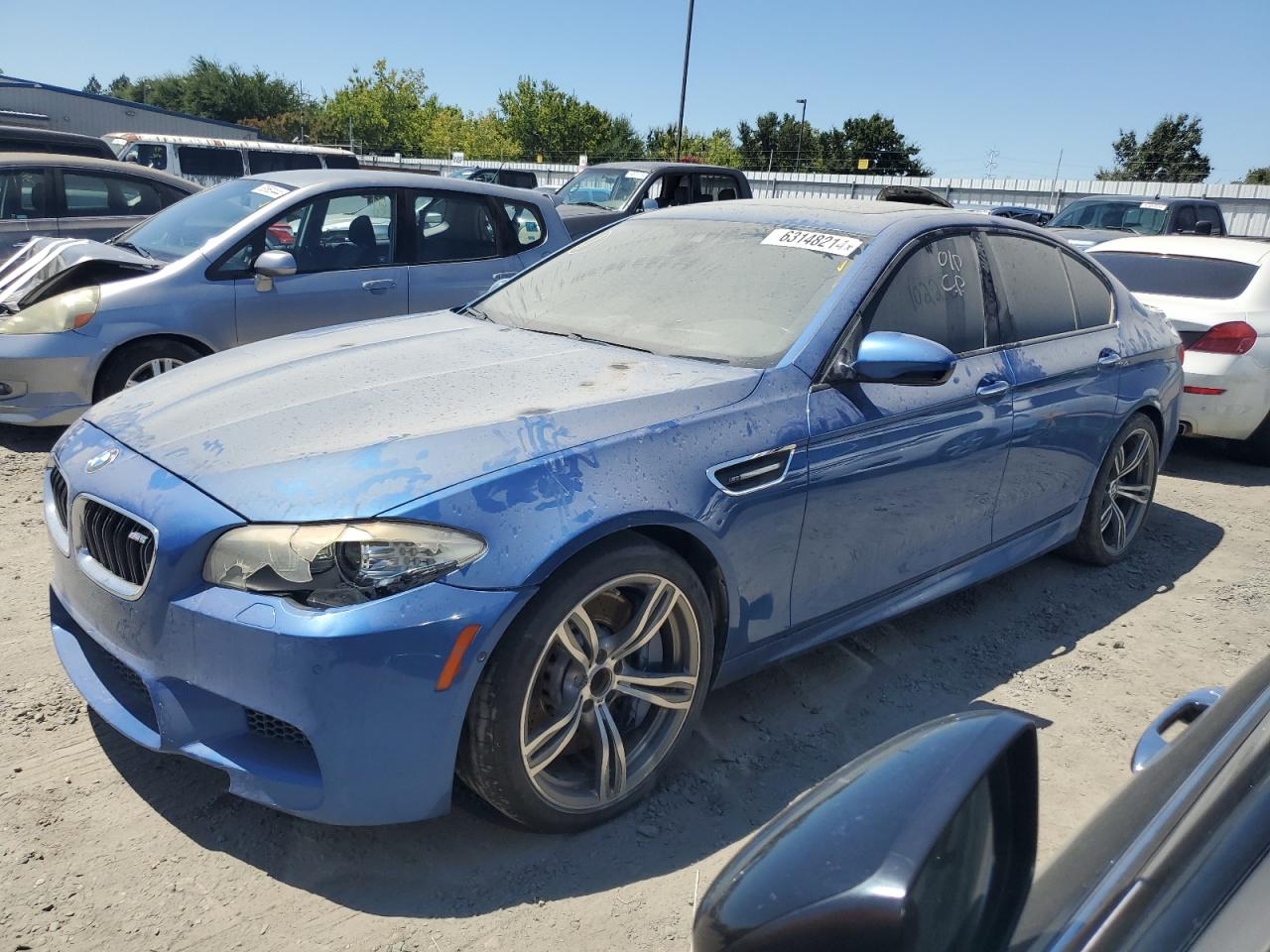 2013 BMW M5 VIN: WBSFV9C59DD095799 Lot: 63148214
