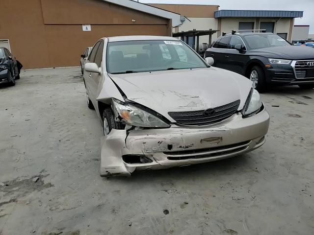 2004 Toyota Camry Le VIN: JTDBE32K040295259 Lot: 65471084