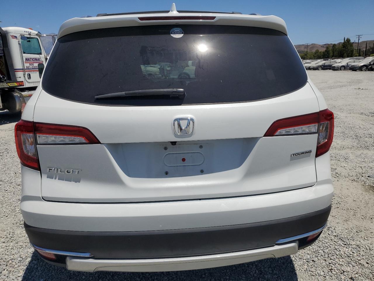 2020 Honda Pilot Touring VIN: 5FNYF5H9XLB012910 Lot: 64111654