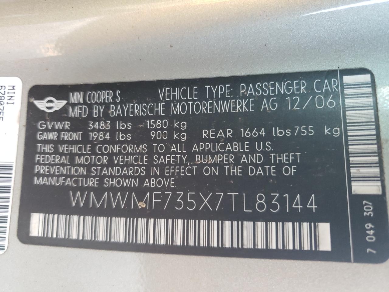2007 Mini Cooper S VIN: WMWMF735X7TL83144 Lot: 63036884