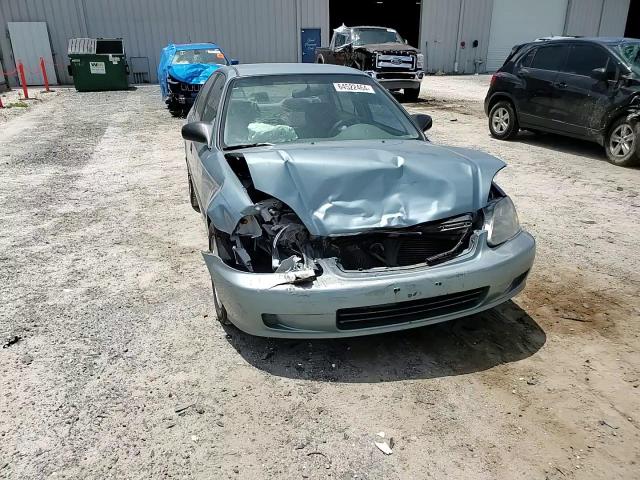 1999 Honda Civic Lx VIN: 1HGEJ6672XL031481 Lot: 64522464