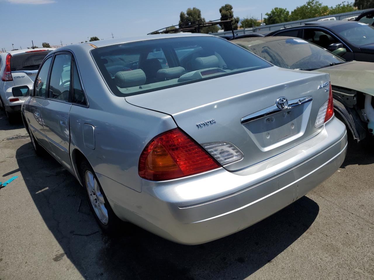 2000 Toyota Avalon Xl VIN: 4T1BF28BXYU027344 Lot: 64509374