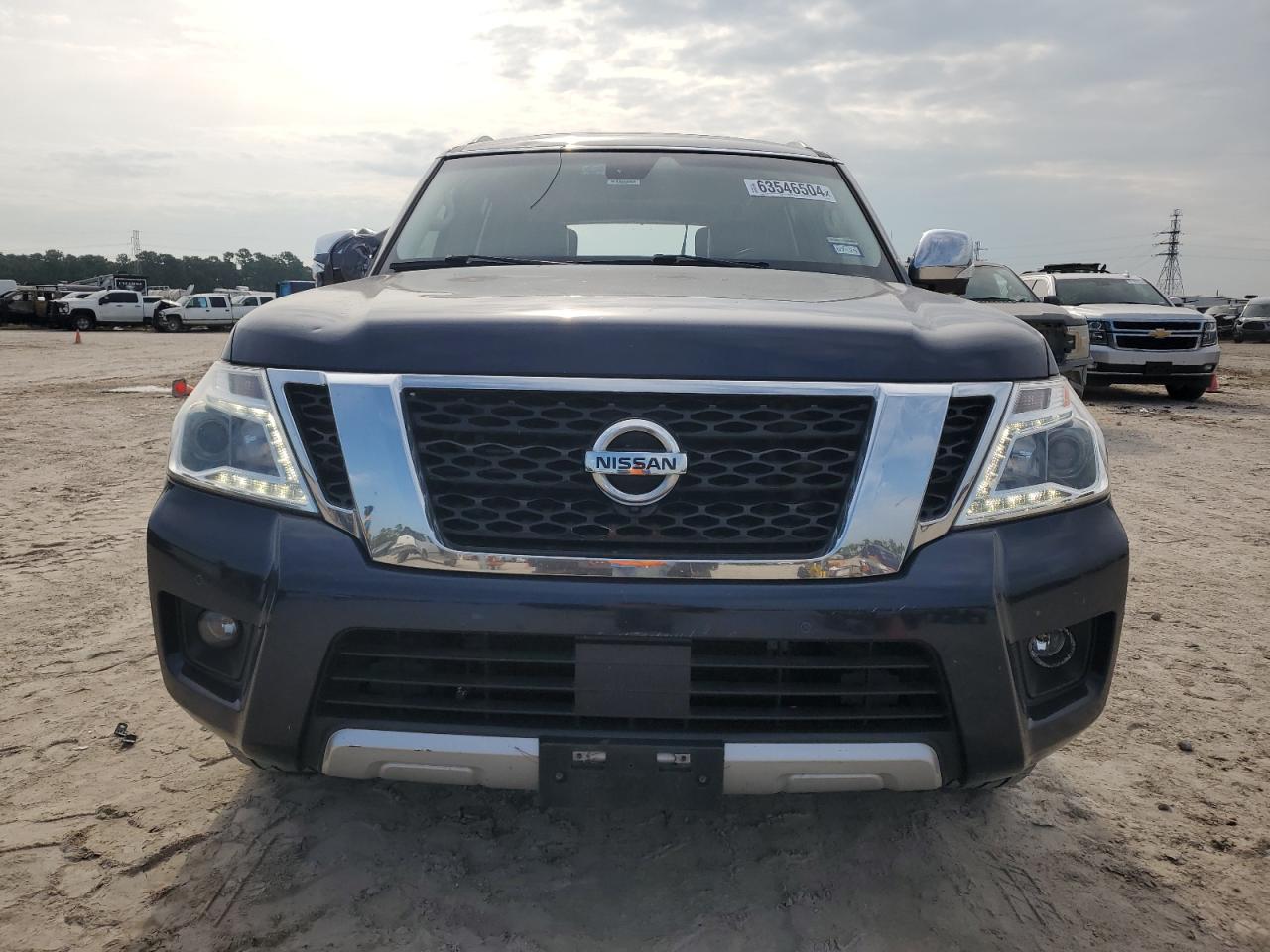 2017 Nissan Armada Platinum VIN: JN8AY2NF0H9302261 Lot: 63546504