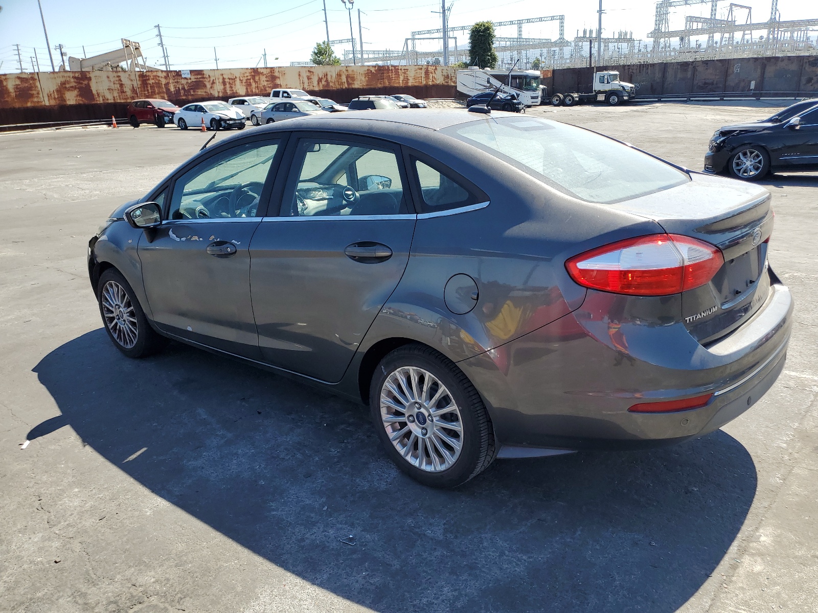 2015 Ford Fiesta Titanium vin: 3FADP4CJ7FM203522