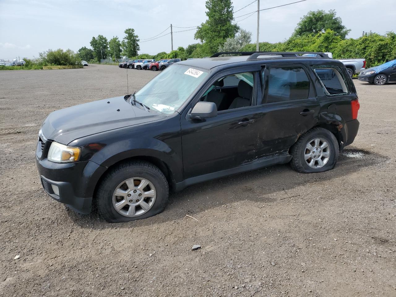2011 Mazda Tribute I VIN: 4F2CY0C74BKM05106 Lot: 64842864