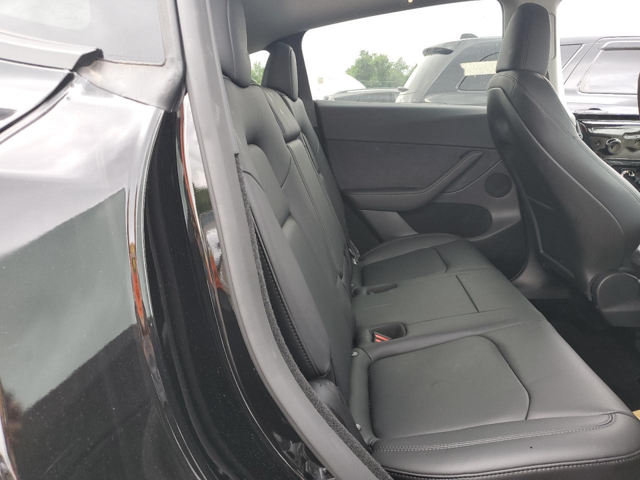 2023 Tesla Model Y VIN: 7SAYGDEE3PF874920 Lot: 61895544