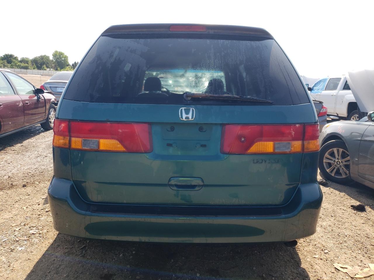 2002 Honda Odyssey Exl VIN: 2HKRL18072H580801 Lot: 63683554