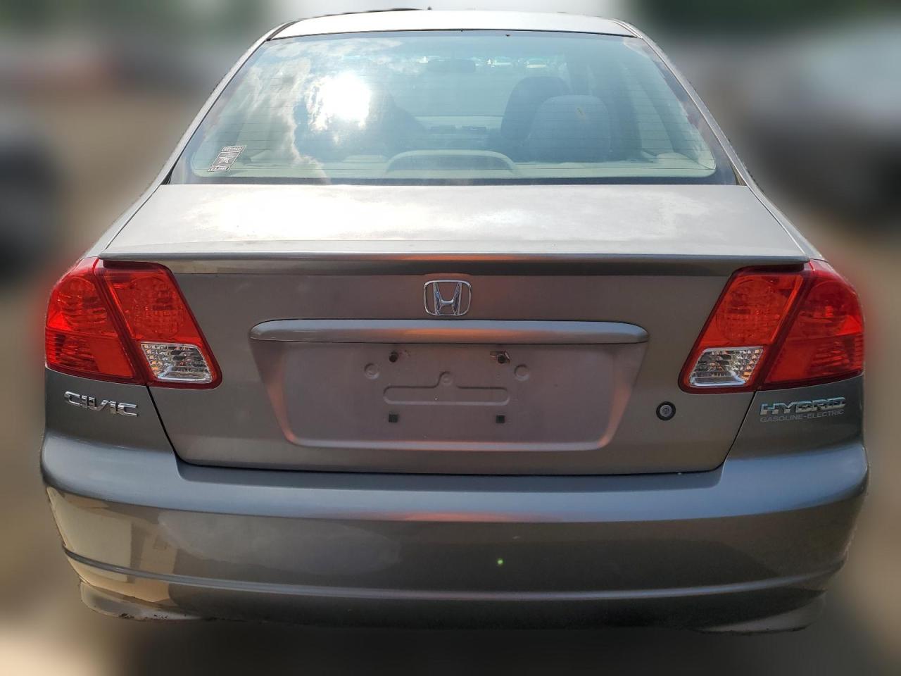 2004 Honda Civic Hybrid VIN: JHMES966X4S010396 Lot: 64611594