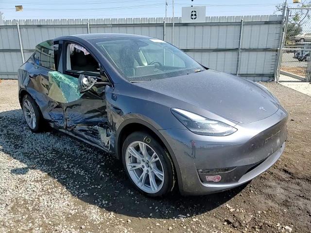 2023 Tesla Model Y VIN: 7SAYGDEE9PF927006 Lot: 60857454