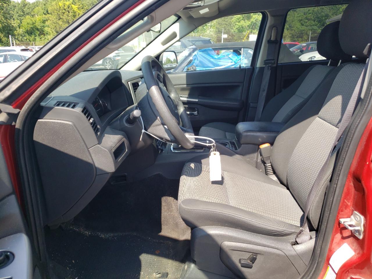 2009 Jeep Grand Cherokee Laredo VIN: 1J8GR48K99C554921 Lot: 63518344