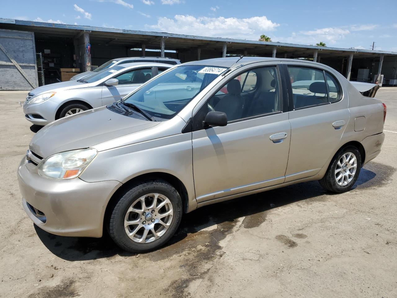 2003 Toyota Echo VIN: JTDBT123530260136 Lot: 63864714