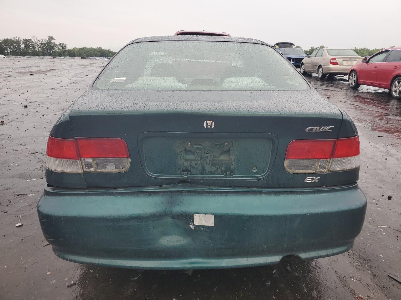 1999 Honda Civic Ex VIN: 1HGEJ8245XL005268 Lot: 64708074