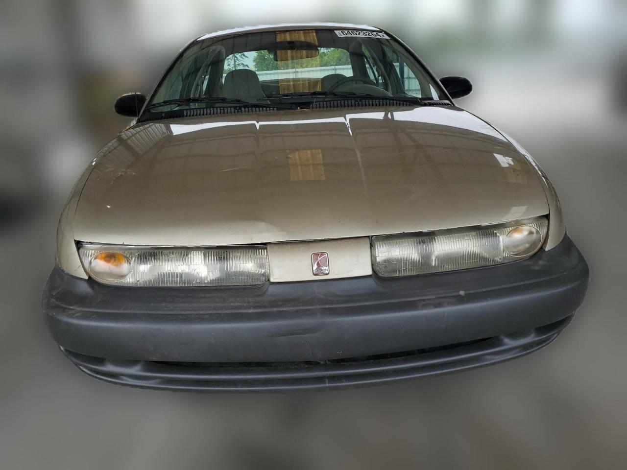 1996 Saturn Sl1 VIN: 1G8ZH5280TZ321174 Lot: 64623264