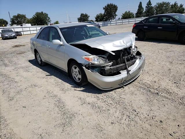 2003 Toyota Camry Le VIN: 4T1BF30K43U556234 Lot: 63875644