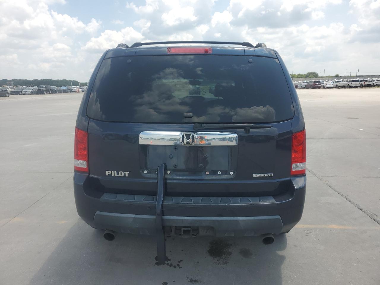 2009 Honda Pilot Touring VIN: 5FNYF38949B023821 Lot: 64721094