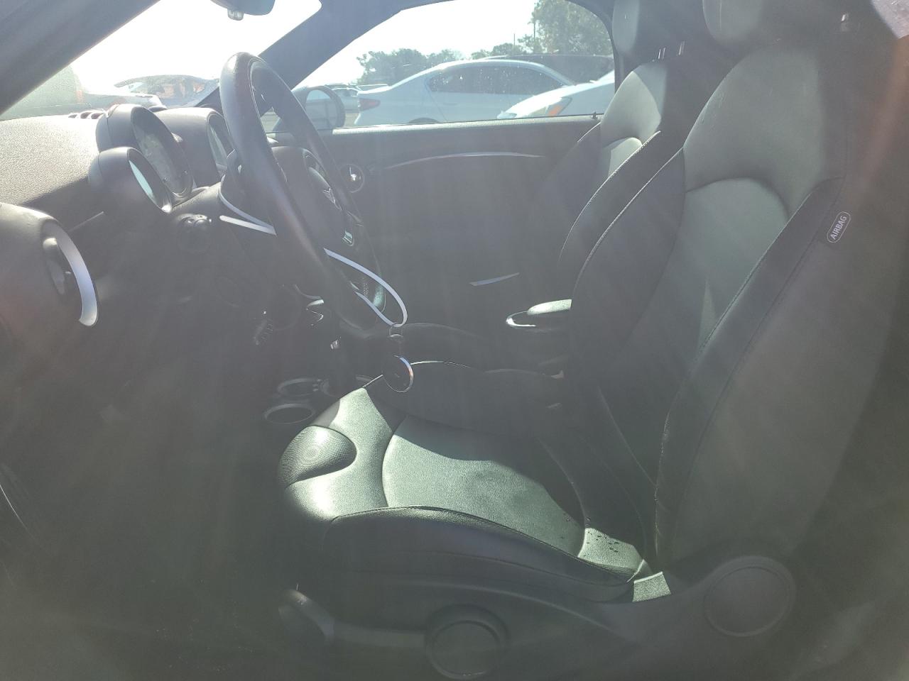 2013 Mini Cooper Roadster S VIN: WMWSY3C5XDT594057 Lot: 65328934