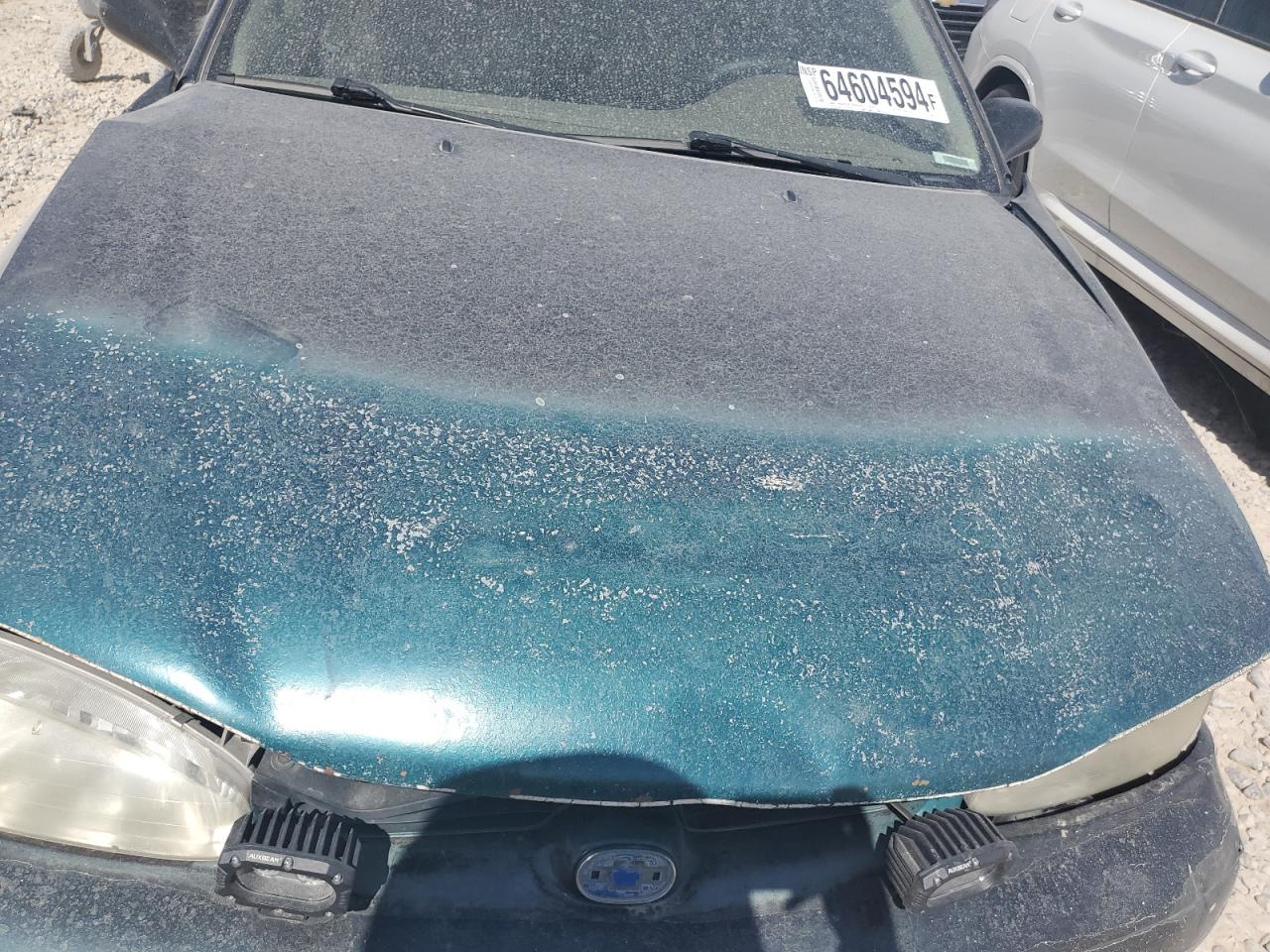 1999 Chevrolet Geo Prizm Base VIN: 1Y1SK5282XZ423120 Lot: 64604594