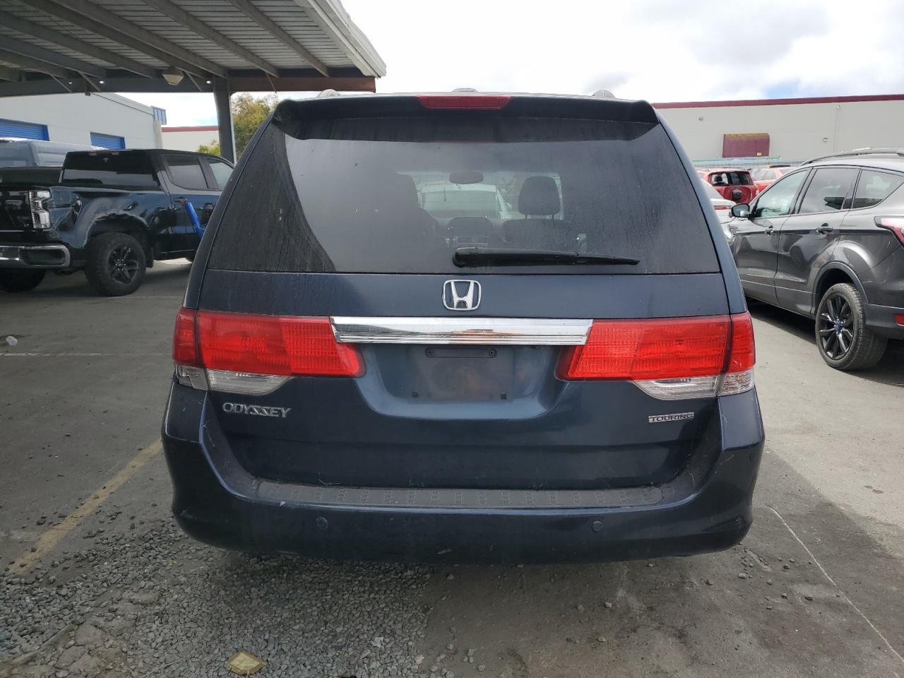 2010 Honda Odyssey Touring VIN: 5FNRL3H93AB058867 Lot: 65388534