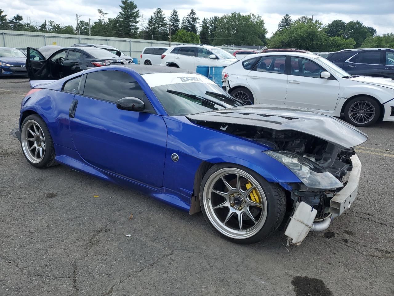 2004 Nissan 350Z Coupe VIN: JN1AZ34D34T165024 Lot: 65228254