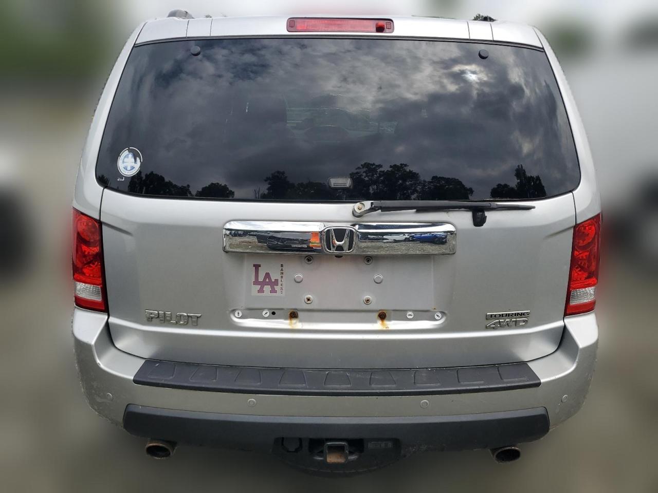 2010 Honda Pilot Touring VIN: 5FNYF4H90AB015466 Lot: 64189104