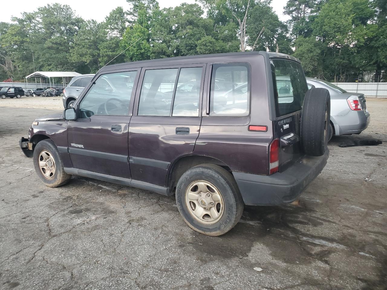 1998 Chevrolet Tracker VIN: 2CNBE1367W6919926 Lot: 63824914