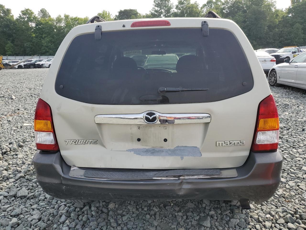 2003 Mazda Tribute Lx VIN: 4F2YZ04163KM46657 Lot: 62437484